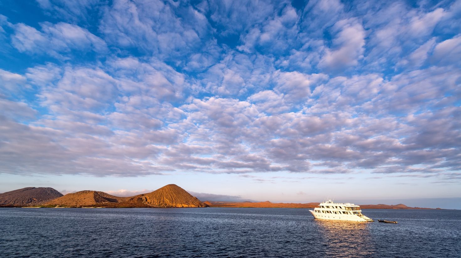 Go on an early morning boat ride during decent weather in Galapagos Islands
