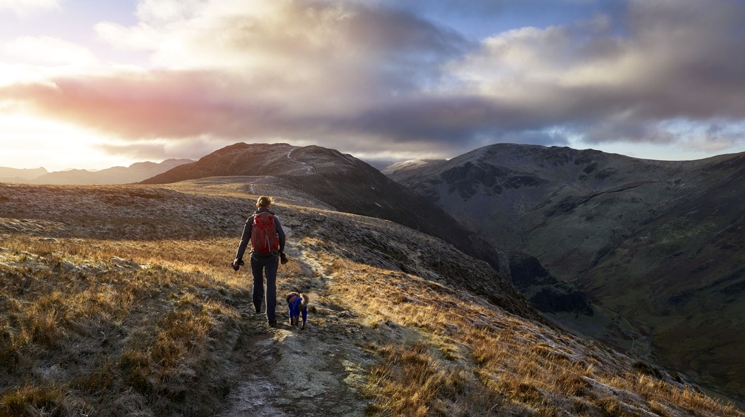 A man hiking towards the Mountain Summit of High Spy from Maiden Moor in th