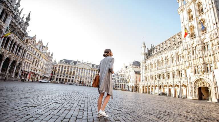 A tourist girl exploring Brussels during her 6 days in Europe tour.