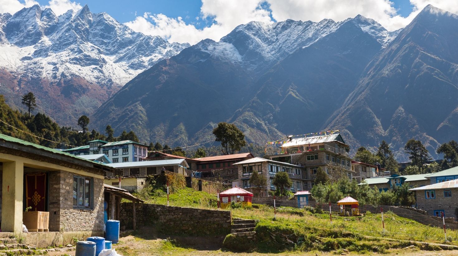 Lukla village has clear weather when trekking Everest Base Camp in October.
