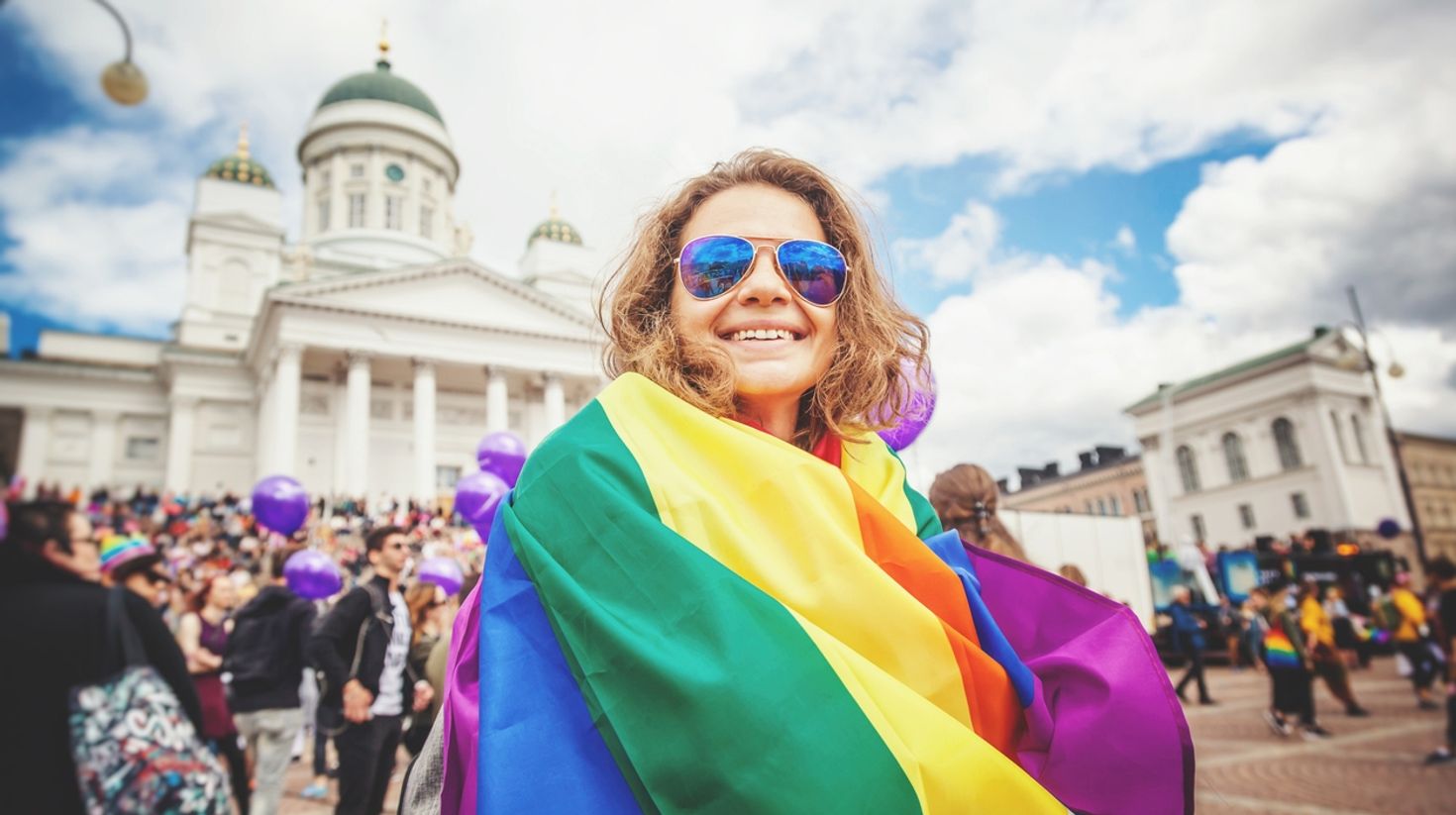 Pride parade participant in Finland in June.