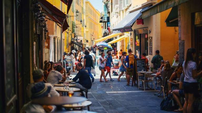 Locals & tourists in the colorful streets of Nice in France during 13 days