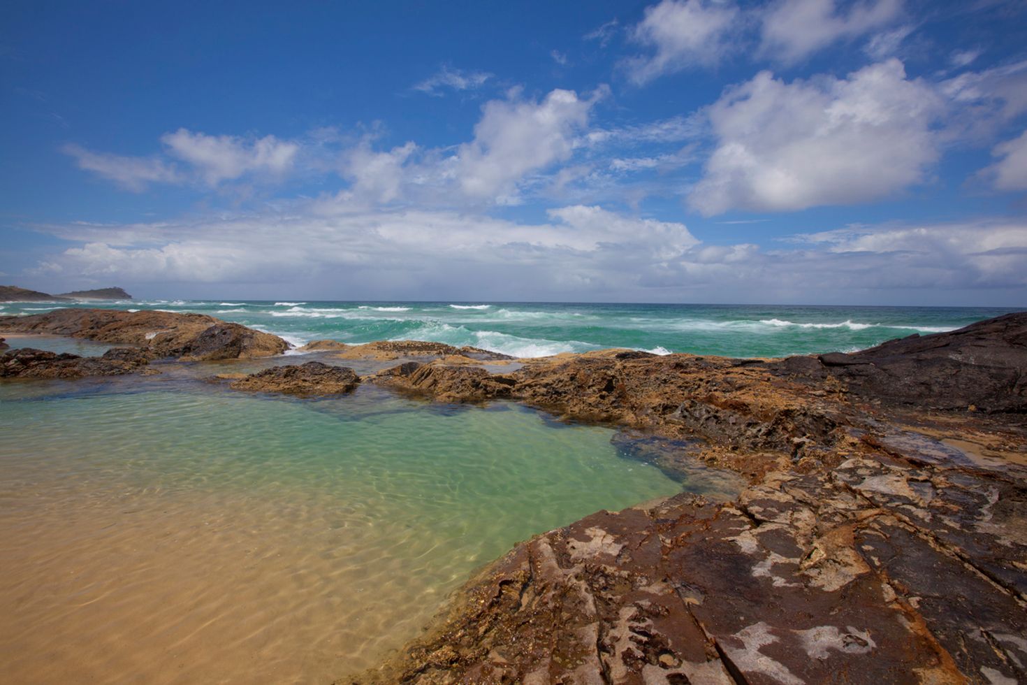Visit Champagne pools on a Fraser island day tour