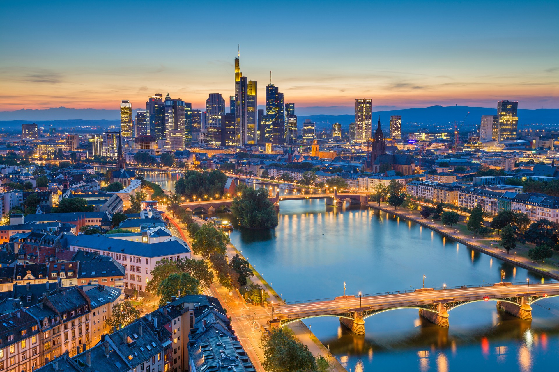 Tour the beautiful city of Frankfurt during twilight blue hour to experience the illuminated city during your 1 week in Germany. Admire the Frankfurt skyline at twilight blue hour during your 1 week in Germany.