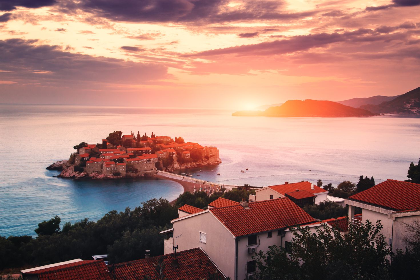Beautiful sunrise in Sveti Stefan island