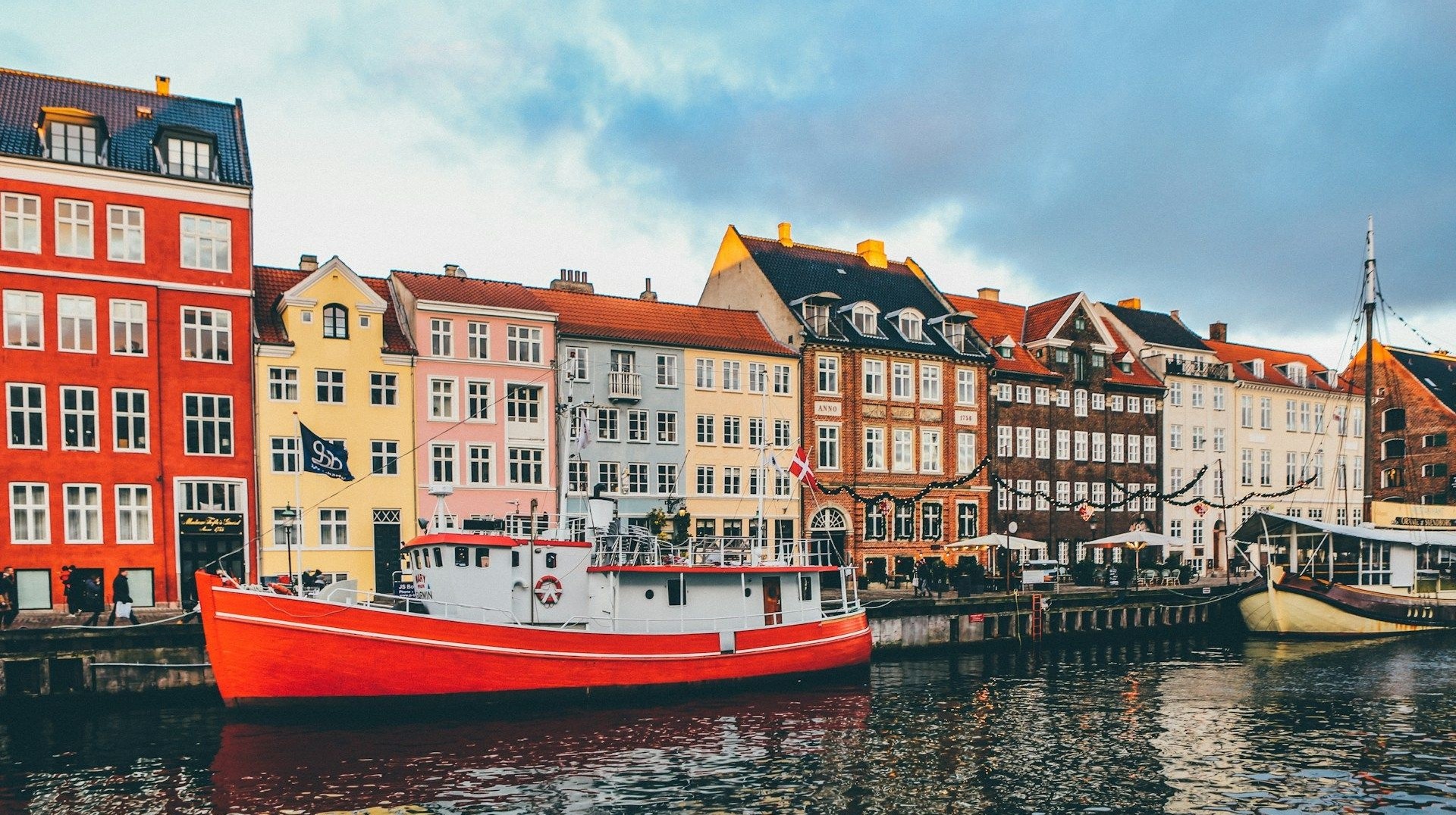 A canal cruise in Nyhavn Harbor is the highlight of any trip to Copenhagen. Visit the colorful Nyhavn harbor, Copenhagen when staying in Denmark