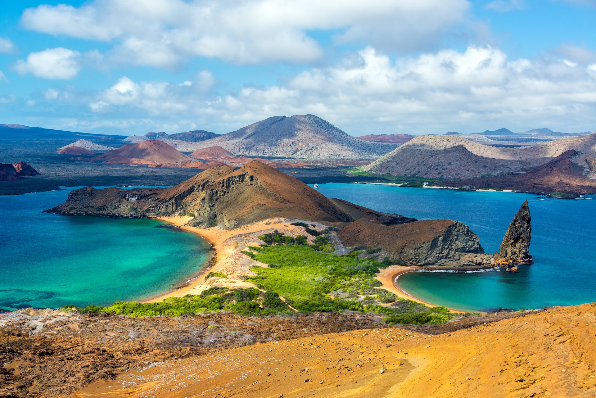 View of two beaches in Bartolome Island in Galapagos Island on a clear day; how many days to spend in Ecuador.