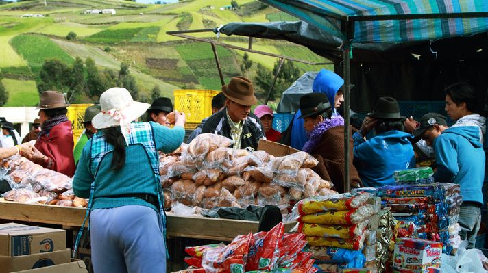Ecuadorian ethnic woman selling pastries