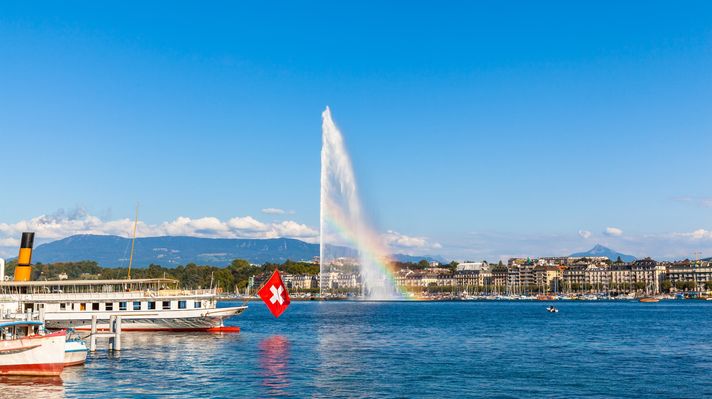 Water jet fountain with rainbow in Geneva, Switzerland