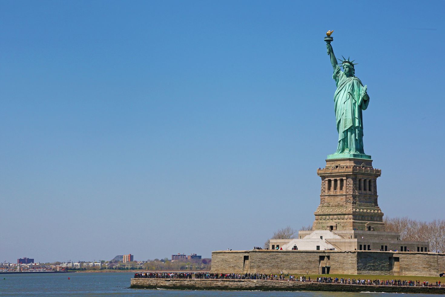 The Statue of Liberty is a neoclassical sculpture places in the city habor.