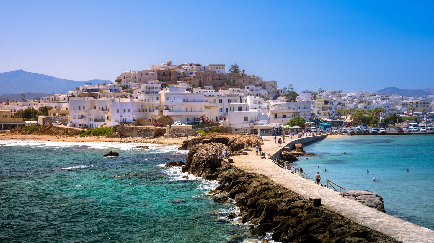 natural stone walkway towards the village, Cyclades, Greece.