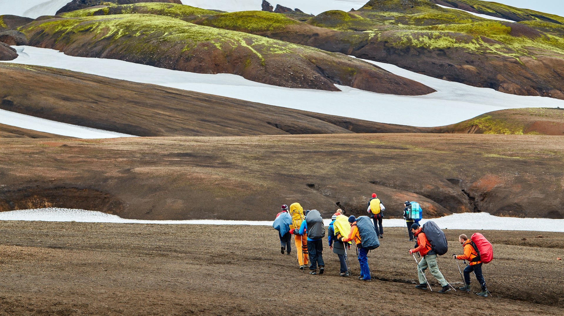 Hikers in the mountains of Landmannalaugar Landmannalaugar in the Highlands of Iceland
