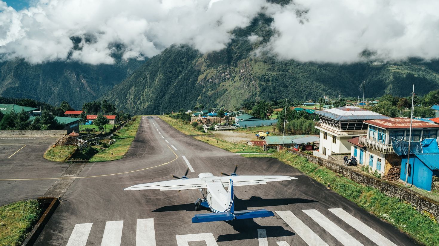 A flight to Lukla is an essential cost to trek to Everest Base Camp.