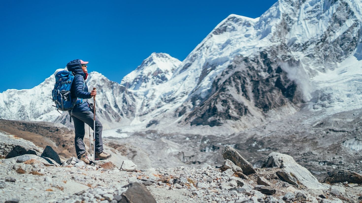 A female backpacker treks to Everest Base Camp.