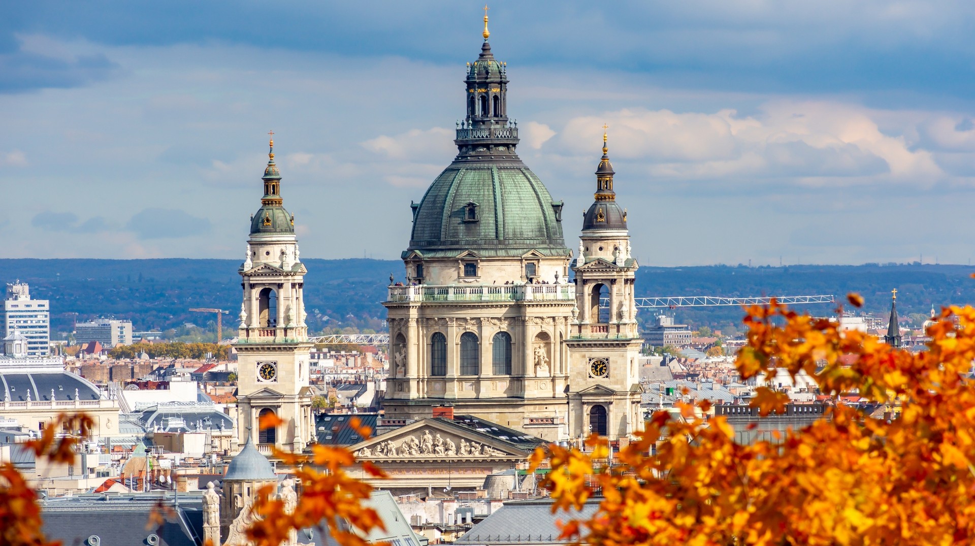 Fall leaves frame St. Stephen's Basilica in Hungary in September.