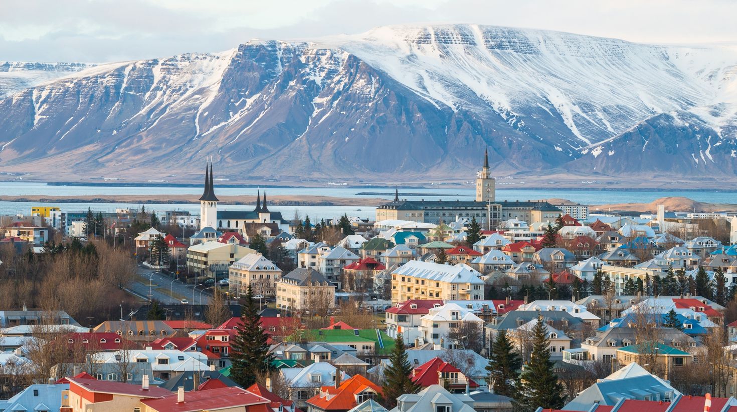 View of Mountains from the bustling city of Reykjavik.