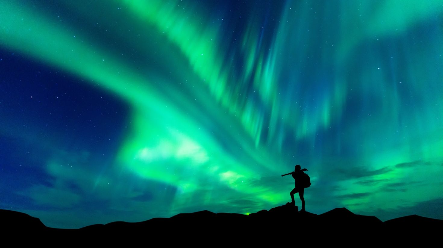 Aurora borealis with silhouette in Iceland