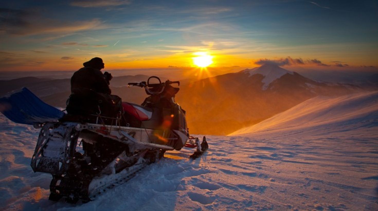Snowmobile on the beautiful winter Icelandic landscape.