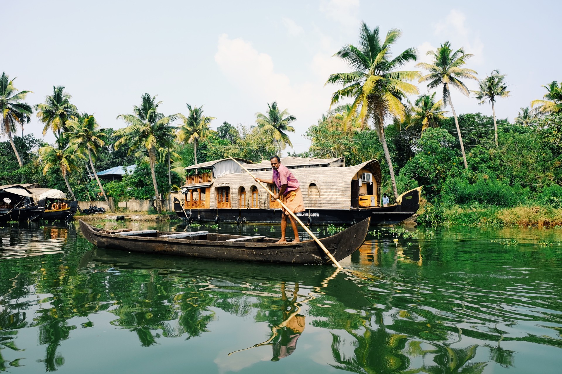 A backwater cruise in Kerala will take you on an intimate experience of the local village life Ride on a boat on the water with palm trees on the shores while spending 2 weeks in India.