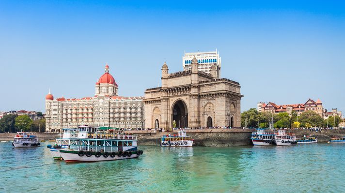 Gateway of India and the Taj Hotel by the sea.