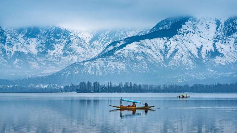View of Dal Lake in winter, and the beautiful mountain range, Kashmir