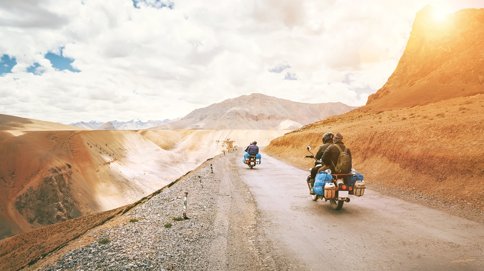 While the monsoon rains may make it tricky, traveling India's picturesque destinations like Ladakh can make your trip worthwhile in India during July. Motorcycle travelers ride on Himalaya roads in India in July.