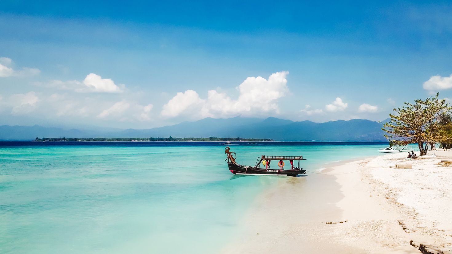 View of boat parked next to the shore on Gili Air, Lombok, Indonesia