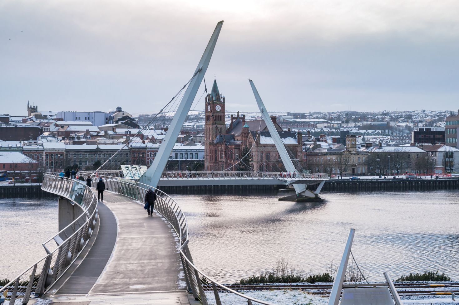 View of the Peace Bridge covered in snow, Derry, Ireland in December
