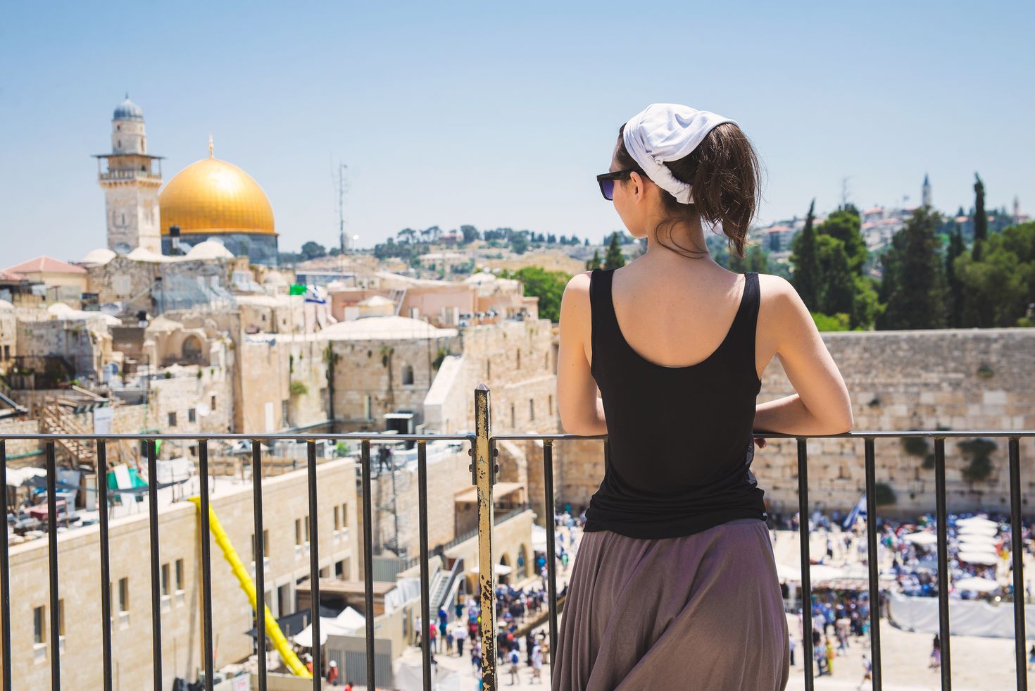 A girl enjoying the view of Jerusalem from the Wailing Wall.