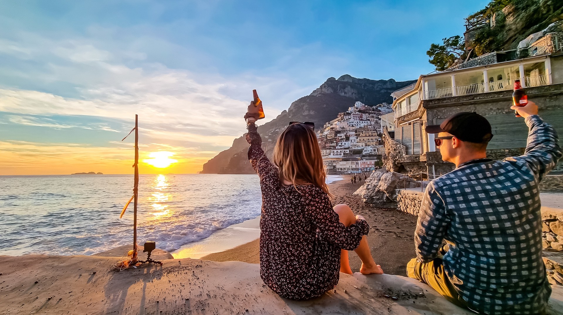 Couple enjoying sunset view in Amalfi Coast during their 10 days in Italy.