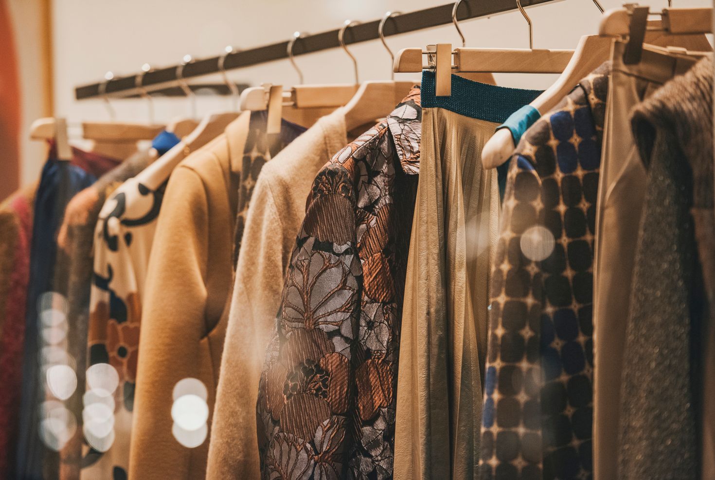 rack the contains different winter clothes