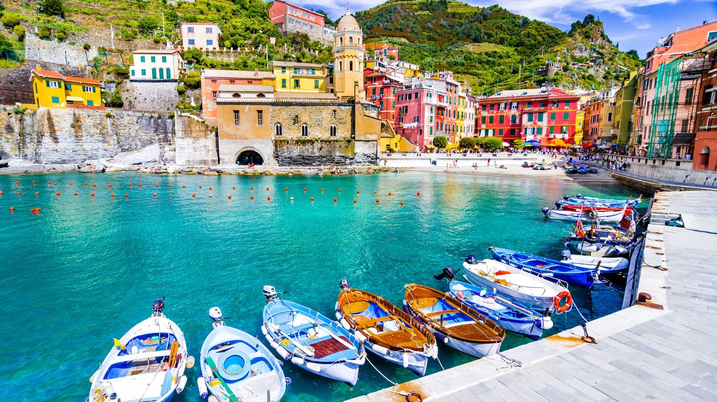 A scenic view of marina in colorful fishermen village Vernazza in Italy.
