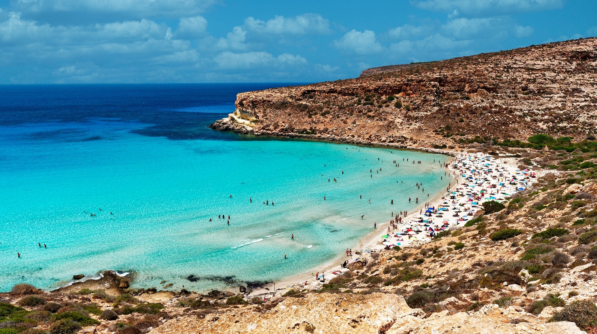 Unwind in the Rabbit Beach and let the charm of one of the finest beaches in Italy in July captivate your senses. The view of Spiaggia dei Conigli in Italy in July.