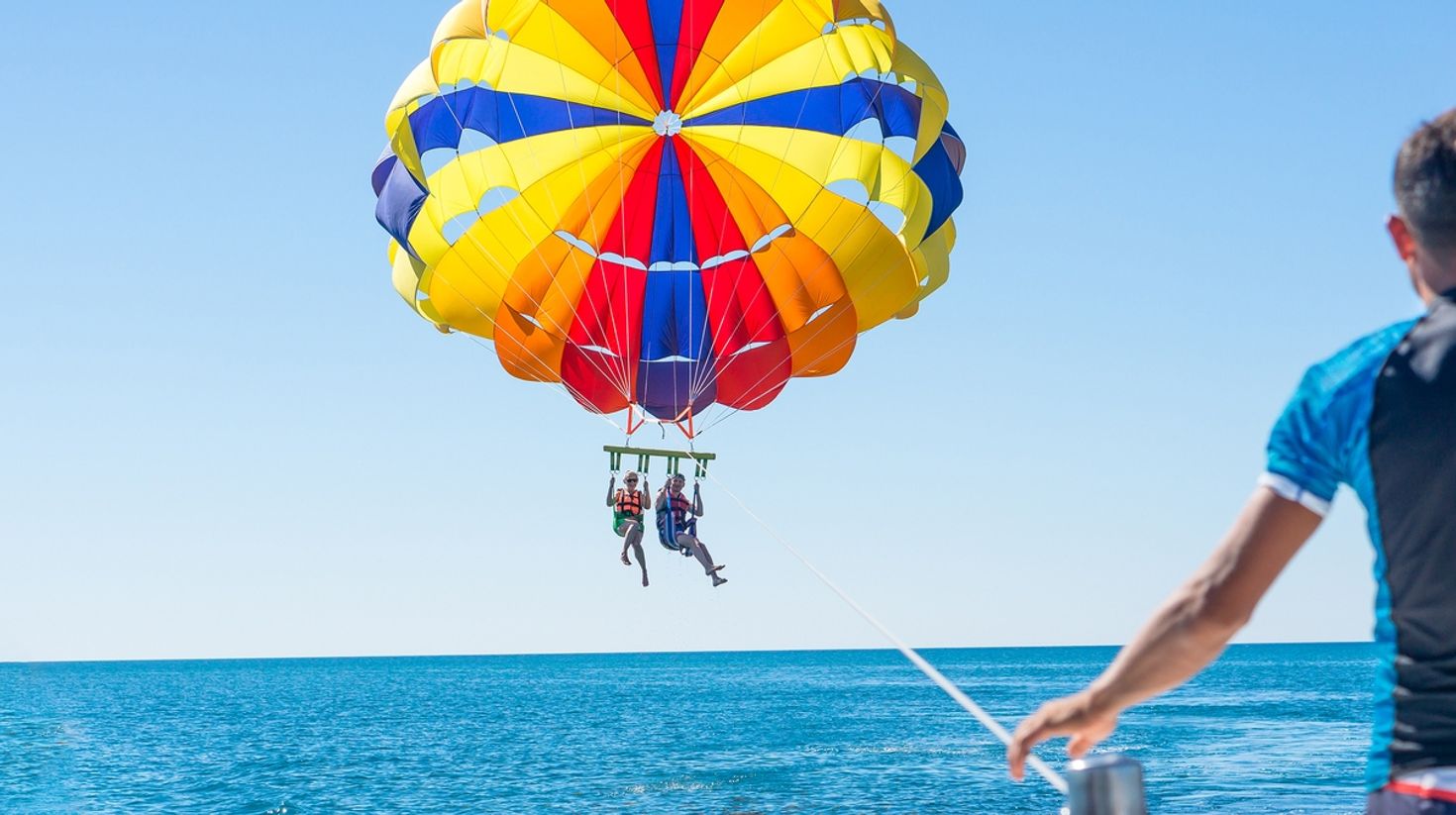 Parasailing in Jaco beach, Costa Rica is a perfect way to enjoy the beach