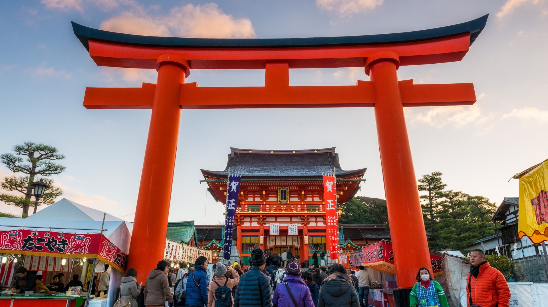 A traditional way to celebrate the new year in Japan is to visit a shrine on the first three days of the year. People enter Fushimi Inari Shrine on New Year's Day in Japan in January.