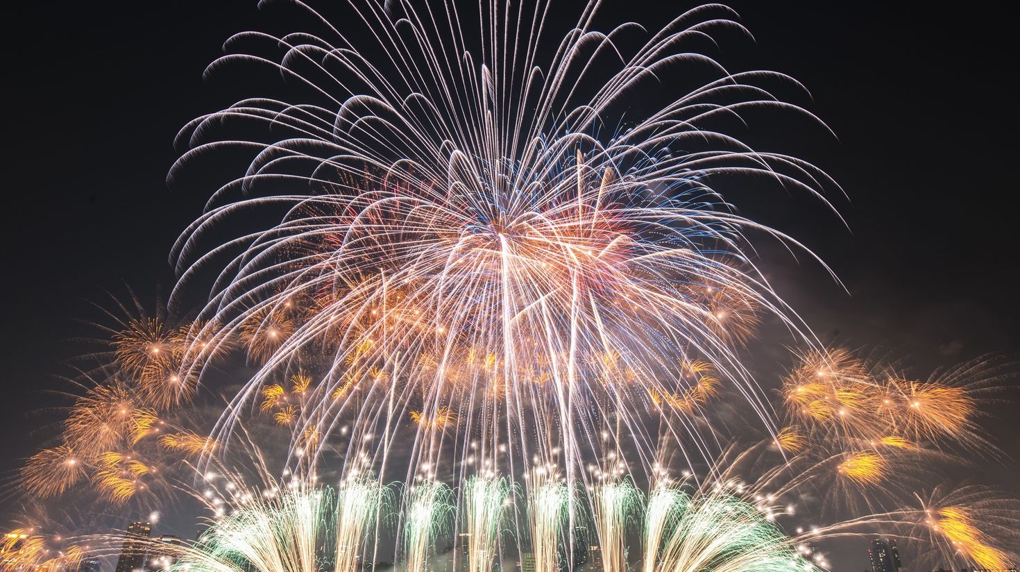Colorful fireworks dye the night sky beautifully in Japan