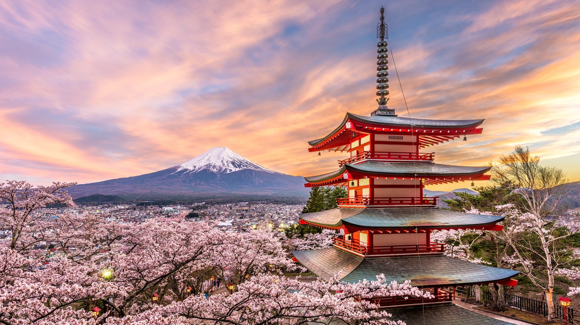 Enjoy the spectacular view of Mt. Fuji and the cherry blossoms from Chureito Pagoda. Chureito Pagoda in the spring with cherry blossoms in Japan in March.
