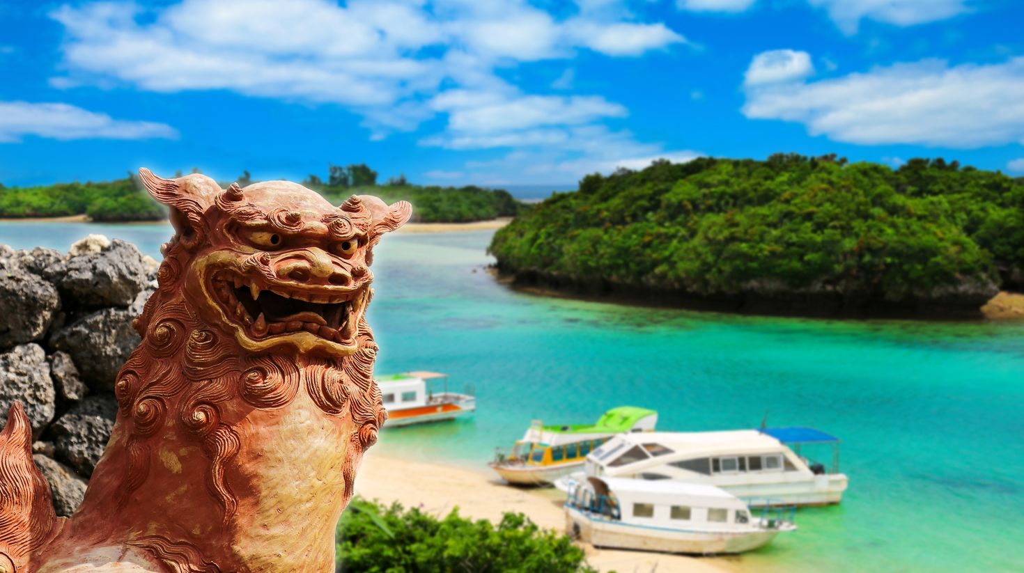 Okinawa Shisa and the beautiful sea during warm weather in Japan.