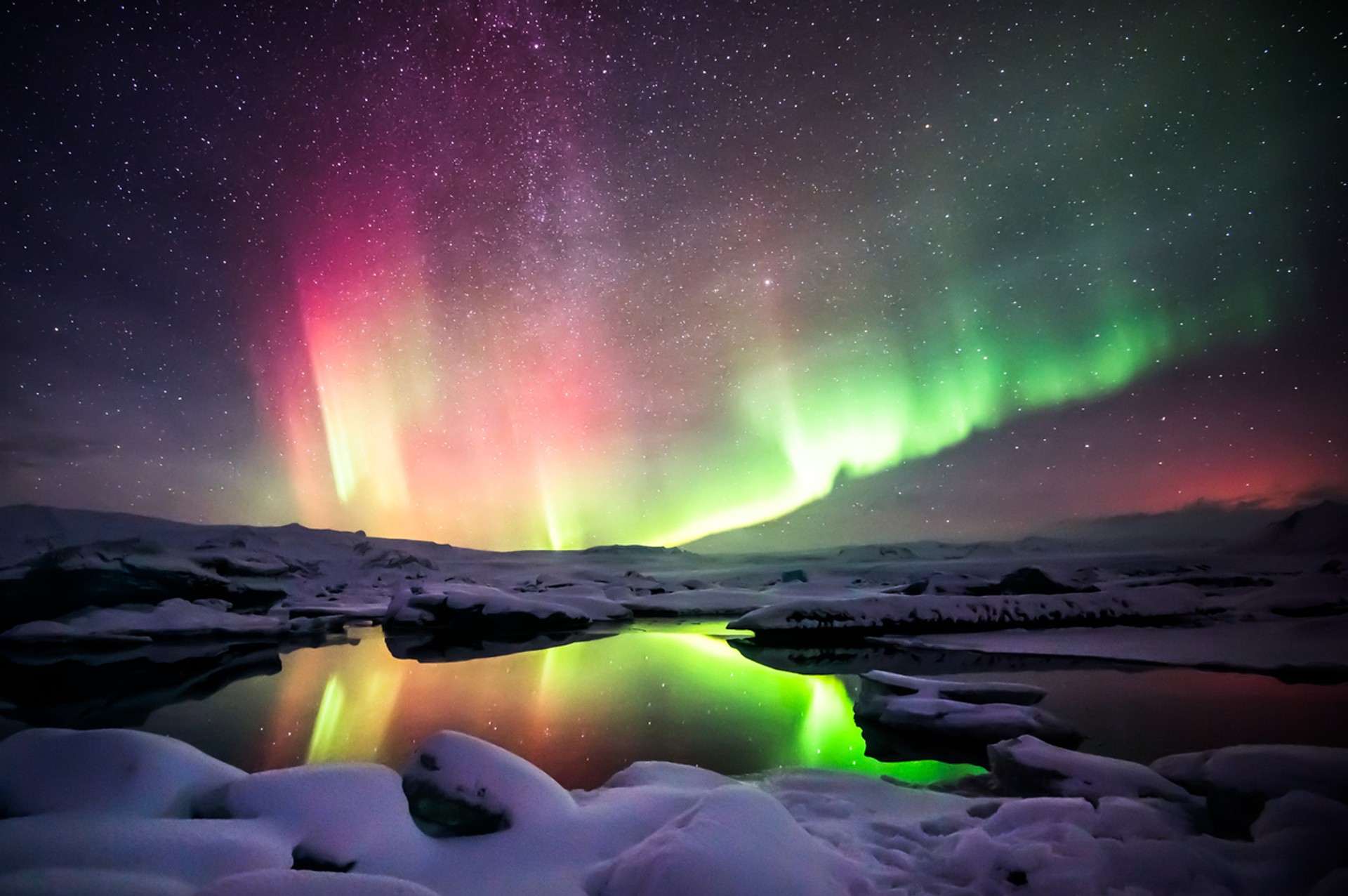 Aurora Borealis over Jokulsarlon glacier lagoon in Iceland