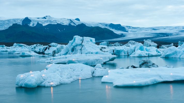 Jokulsarlon glacier lagoon's icebergs illuminated with candles