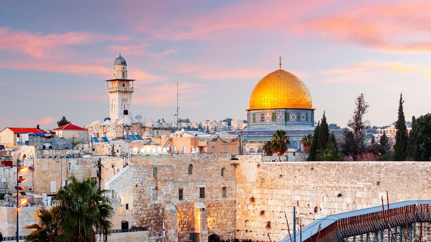 Jerusalem at the Western Wall and Dome of the Rock at dusk in the old city.