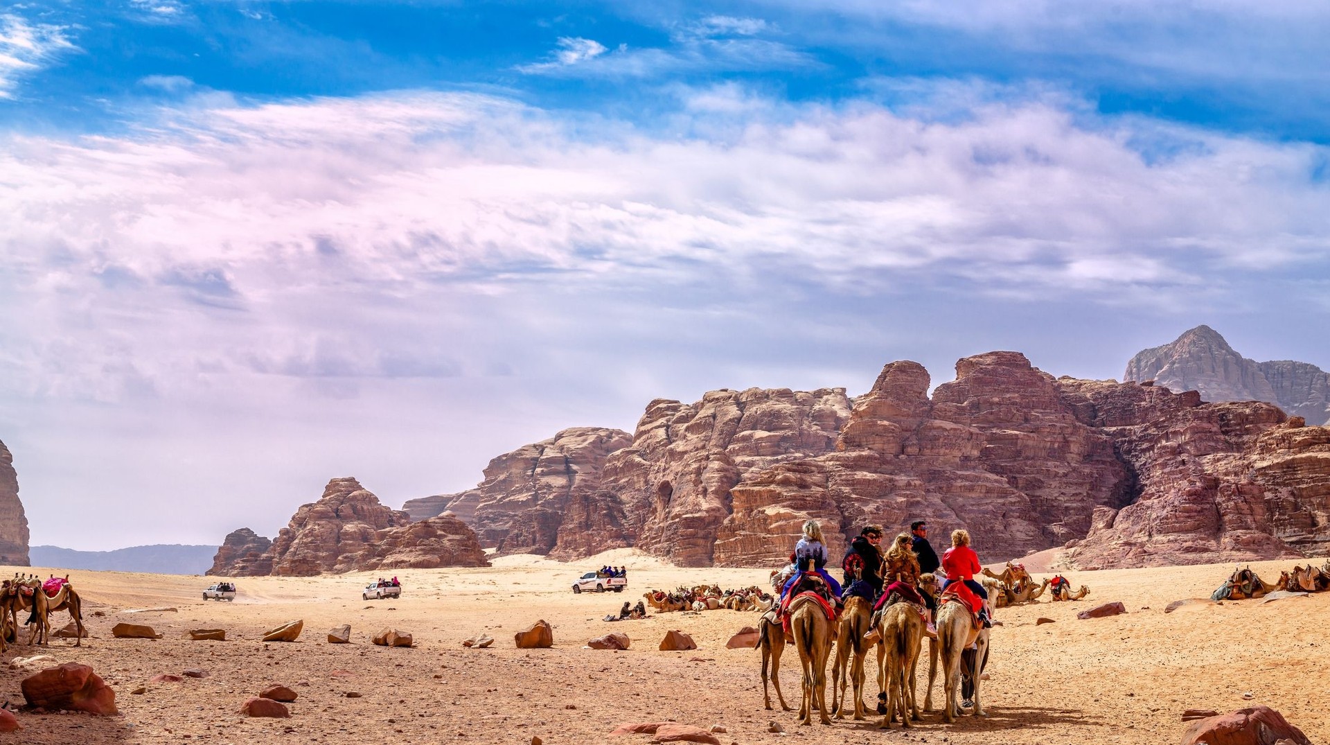 Tourists enjoying camel rides in Jordan in May.