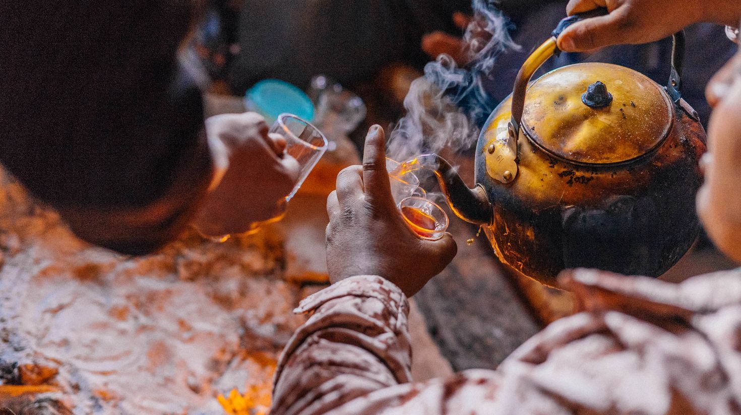 Bedouin man pouring traditonal tea in Jordan in November