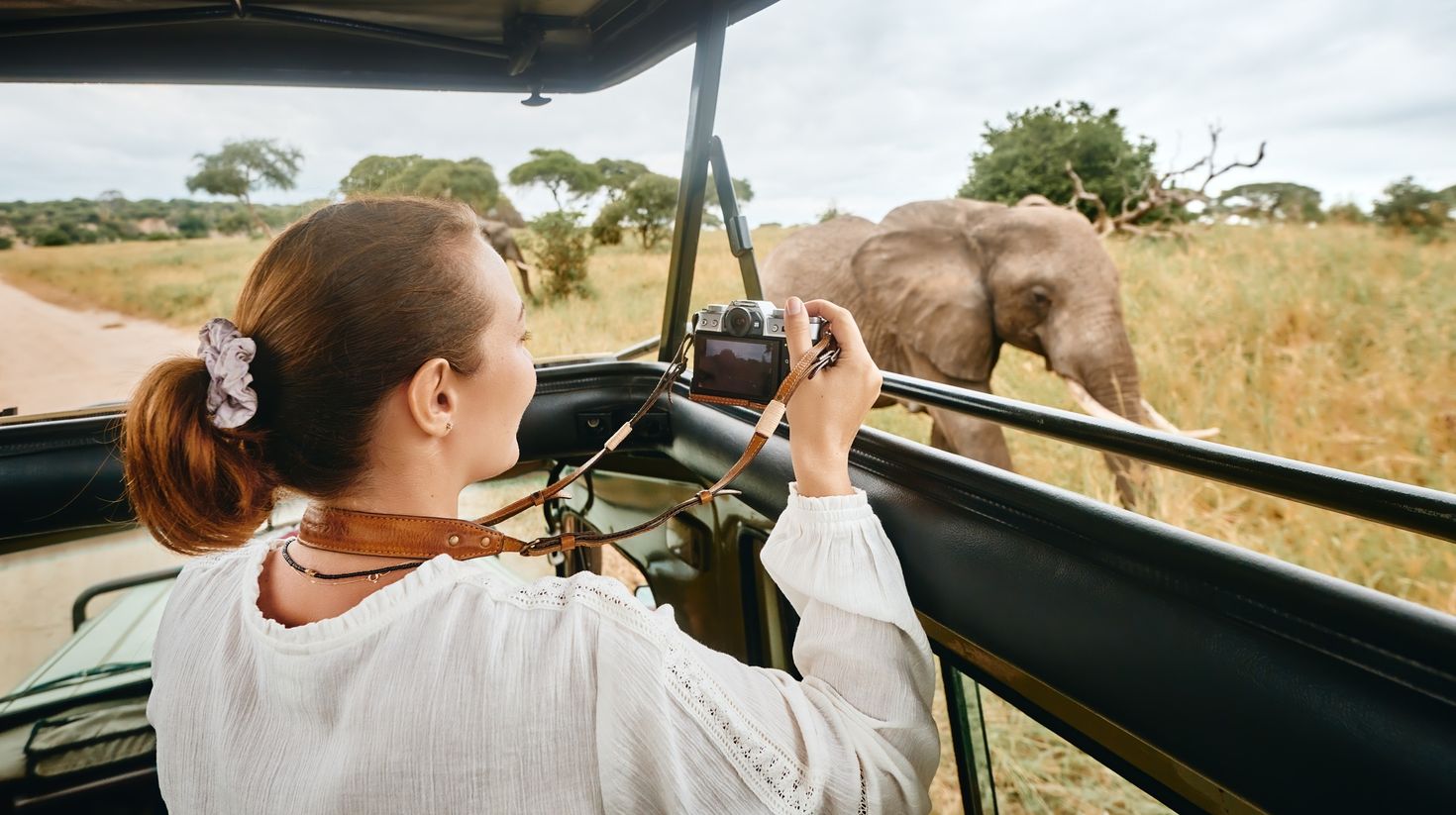 traveling by car with an open roof in Kenya in September