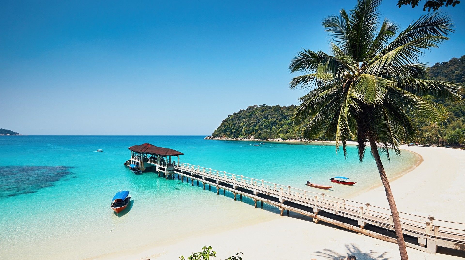 Malaysia in January is the perfect time to visit its idyllic beaches and enjoy outdoor activities such as hiking. Perhentian Islands in Malaysia in January on a clear sunny day.