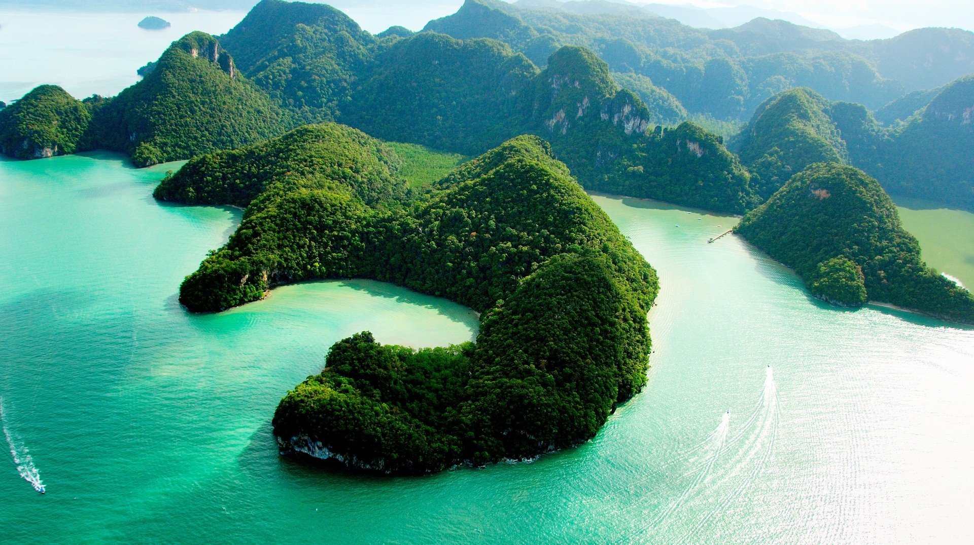 Visit Dayang Bunting, also known as the Island of Pregnant Maiden during your trip to Malaysia in March. Aerial view of Dayang Bunting in Malaysia in March.