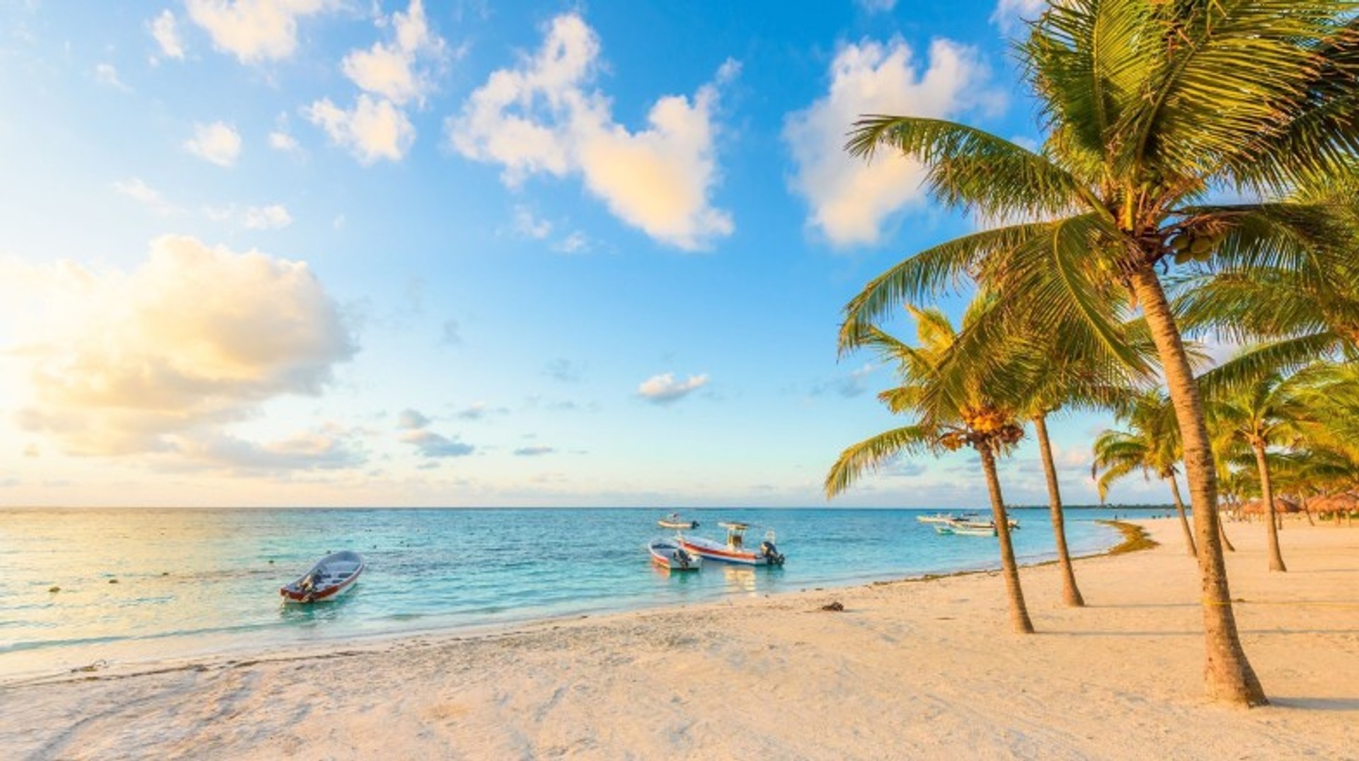 Soak up the sun and unwind on stunning beaches, where crystal-clear waters and golden sands create the perfect paradise during your 12 days in Mexico. The view of Tulum Beach on a summer evening during your 12 days in Mexico.