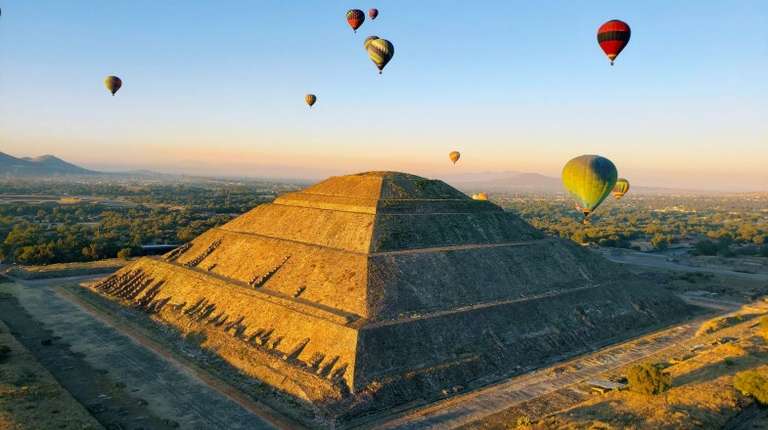 Ride a hot air balloon above Teotihuacan while spending 2 weeks in Mexico.