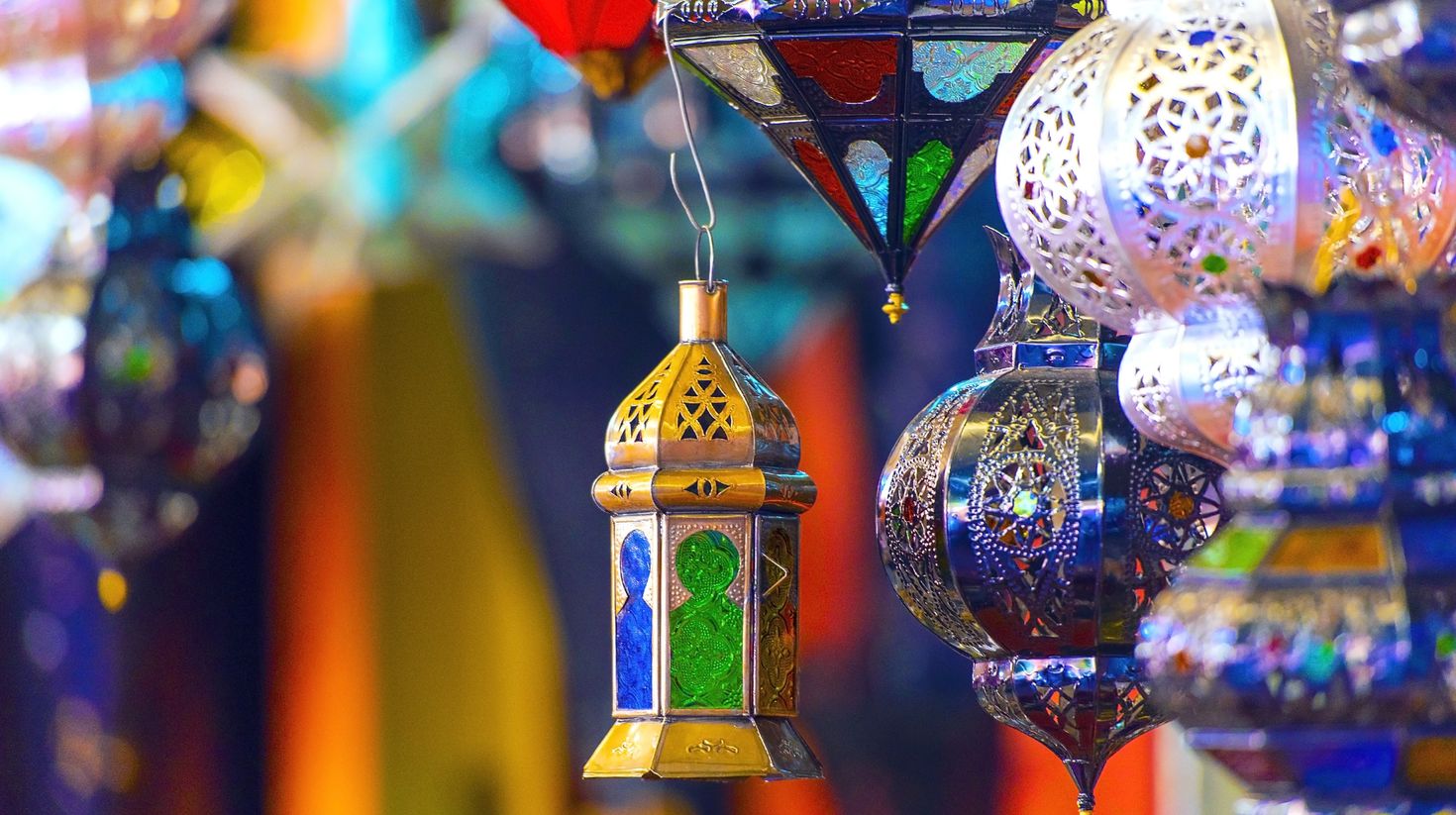 Traditional souvenir Moroccan lamps at the oriental market in Morocco