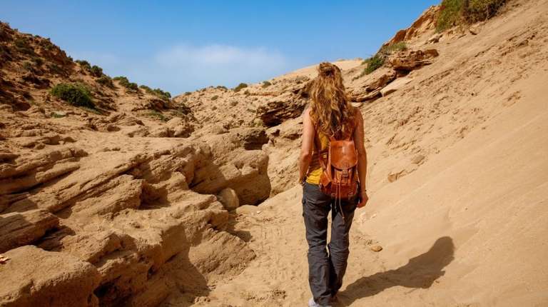 A hiker girl in Morocco in May.
